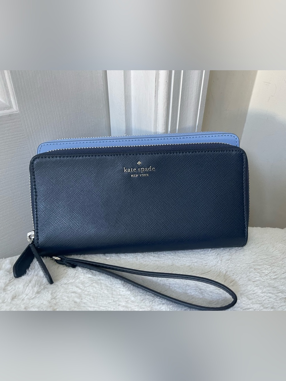 kate spade navy and light blue zip-around wristlet wallet